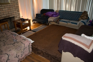 bed on floor in lounge room